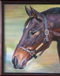 Framed painting of a horse